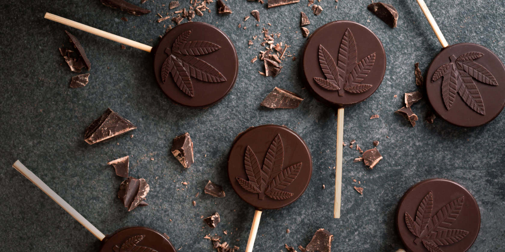 Delicious cannabis-infused chocolates with leaf designs at Spliff Nation Dispensary.
